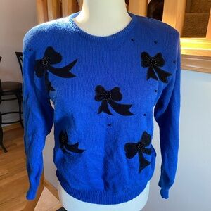 Blue Sweater with Black Bow Details